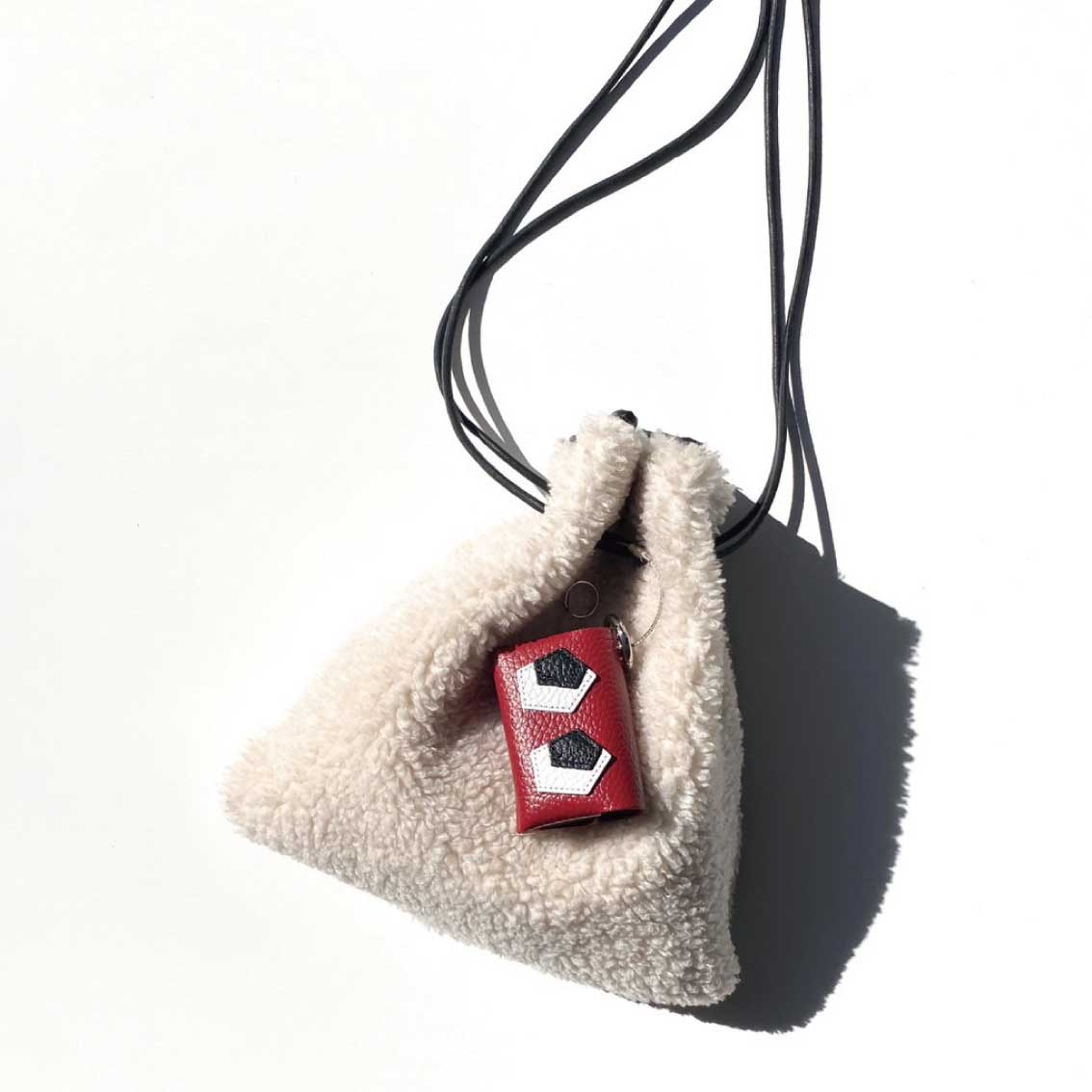 FOLDING TRIANGLE COIN CASE by BATeMON